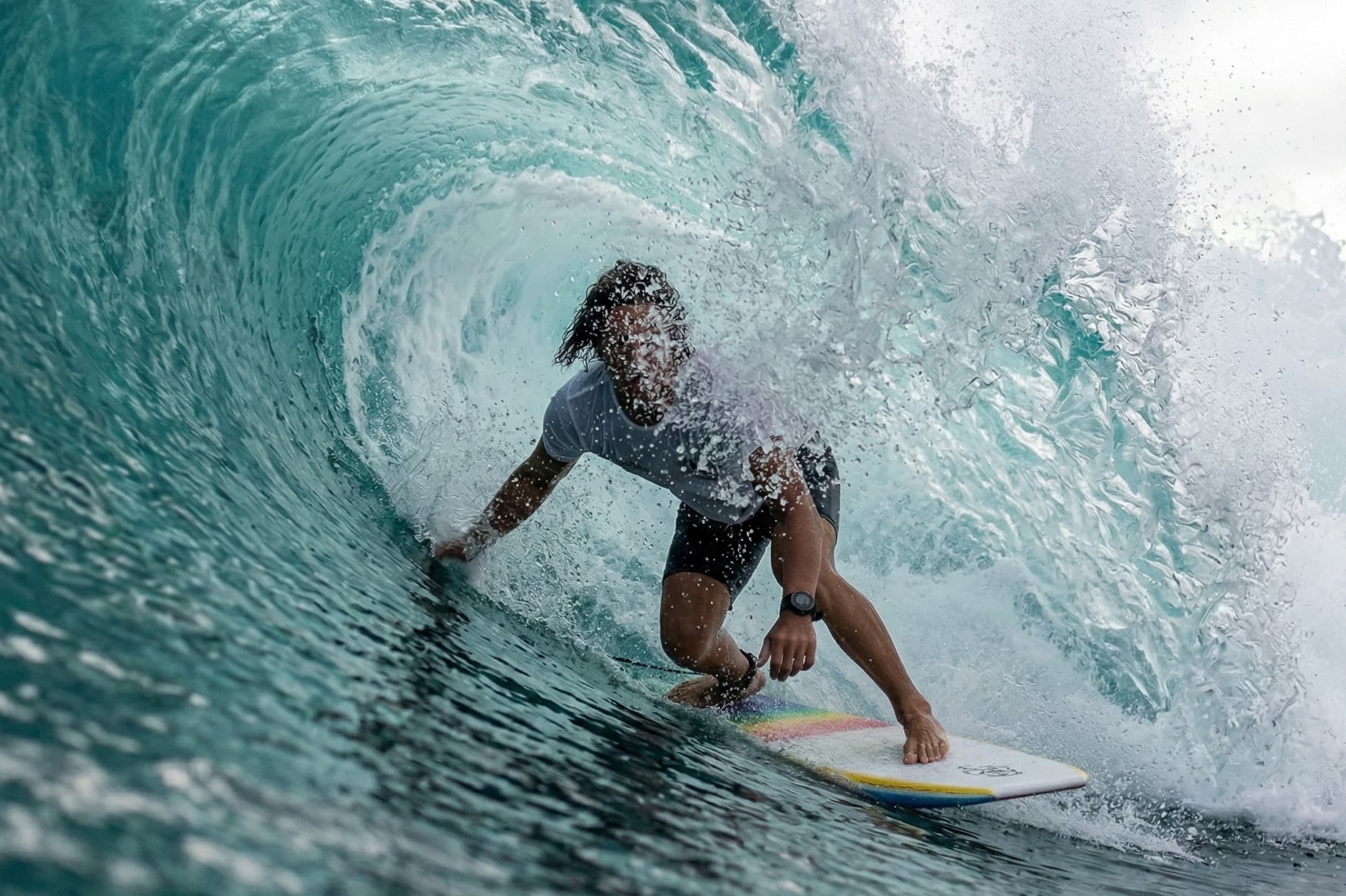 Surfer catching a wave